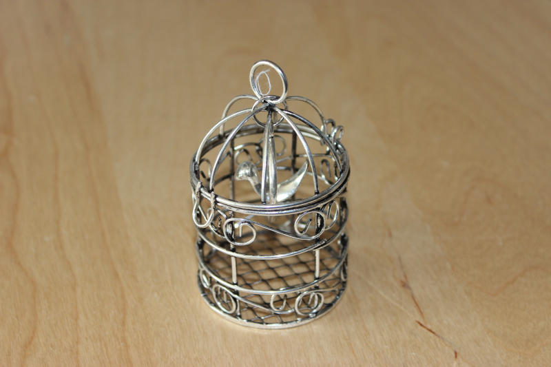AL-3264-516   Metallkäfig mit Vogel